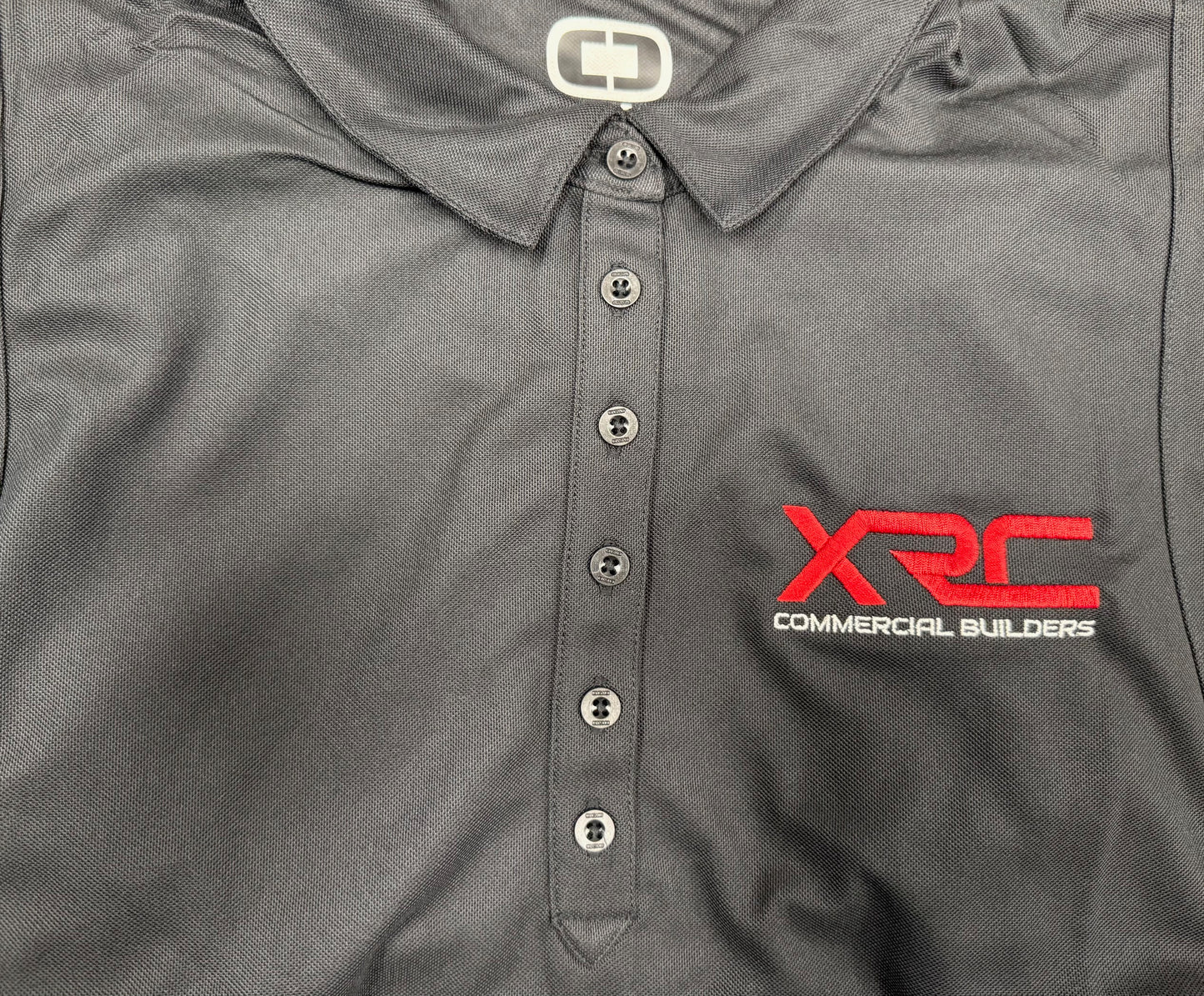 XRC - LOG101  OGIO® Jewel Polo - Black -